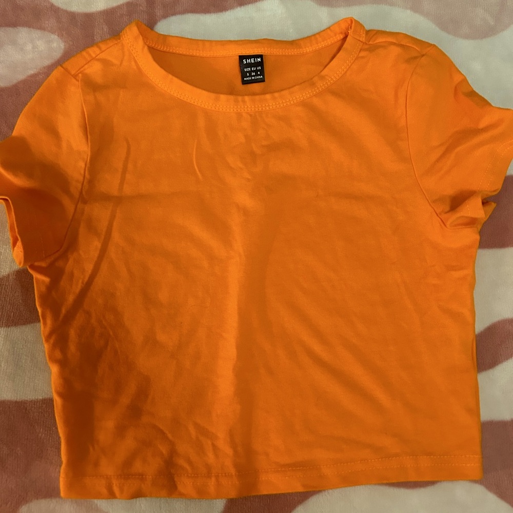 Size s, orange crop top